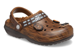 a pair of Crocs shoes, brown, with a contrasting strip meant to emulate Chewbacca