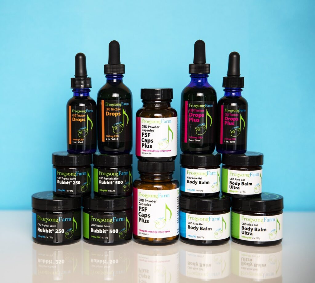 Bottles and tubs of Frogsong CBD products.
